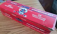Closed red Score 1988 Premier Edition collector box highlighting 660 player cards and 56 Magic Motion trivia cards text