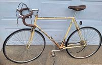 Full side view of Motobecane Grand Resort bicycle showing frame, wheels and overall condition