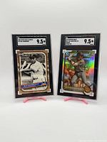 Front view of both SGC-slabbed cards showing grades