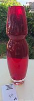 full view of red vase