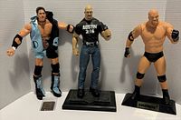 Front view of all three figures with accessories