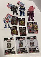 Overall lot showing loose ReAction figures, Nano Metalfigs, Nano Hollywood Rides pack and Micro Comic Fun Packs