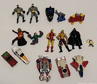 Group shot of all action figures and vehicles