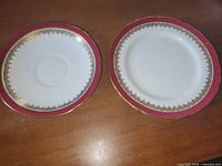 Front view of saucer and bread plate showing pattern and colors