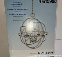 Front of box showing chandelier image, branding, specs