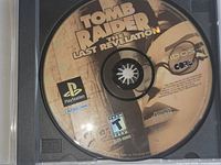 Game disc close-up showing title and publisher details