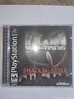 Front of PS1 game case showing cover art and ratings
