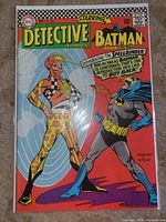 Front cover of Detective Comics #358 in bag