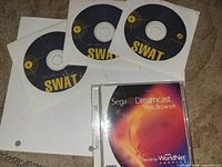 Three SWAT PC discs and Dreamcast Web Browser jewel case front