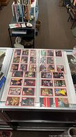 Binder pages showing multiple M*A*S*H trading cards