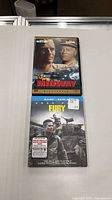 Front view of both movie cases: Midway DVD on top, Fury Blu-ray below