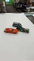 All three Hot Wheels cars together