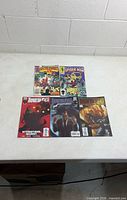 Group shot of all five Marvel comics
