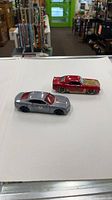 Top view of both die-cast Camaros side by side