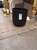 front view of black planter