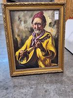 Frontal view of framed oil portrait showing subject, frame details, size sticker