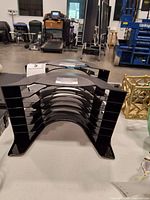 Front view of both black plastic incline desk sorters showing slot configuration
