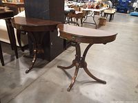 Pair of demi-lune mahogany console tables, full view