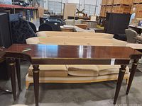 Full front view of mahogany console table