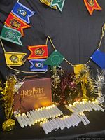Full lot: candles lit, banner, weights, game box