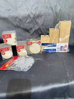 All packaged wooden shapes, wood slices, block set and snowflakes displayed