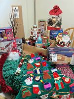 Overview of lot showing cookie jar, nutcracker, ornaments boxes, gnome, ceramic tree, Advent calendar, bows