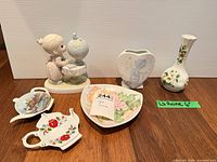 All six porcelain items displayed together for scale and condition reference