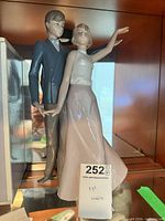 Front view of Lladro/NAO porcelain figurine showing full figures and finish