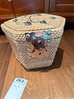 Wicker carrying case with metal clasp