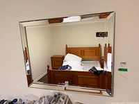 Front view of rectangular mirror on wall