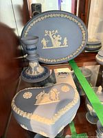 Group shot showing candlestick, oval plaque, heart box