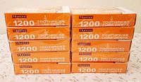 Ten sealed orange Montini 1200 count toothpick boxes stacked
