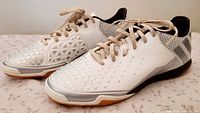 Lateral view showing overall design, textures, gum soles