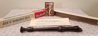 Recorder with manual, warranty card and box laid out