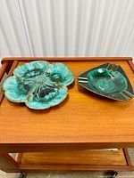 Overview of both ceramic pieces on table