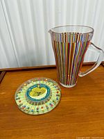 Pitcher beside round party pick holder
