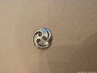 front view showing abstract swirl design