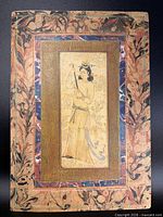 Full view of mounted Persian miniature painting showing entire composition and marbled borders