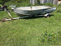 Side view of boat on trailer