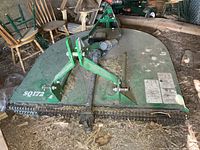 Full top view of rotary cutter showing deck, hitch arms, PTO shaft, model decal SQ172