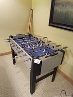 Three-quarter side view of full foosball table