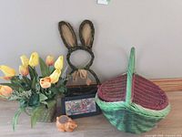 Group shot of basket, tulips, bunny wreath, framed print, squirrel