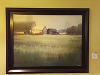 Full view of framed canvas print on wall