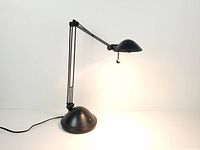 lamp illuminated showing full height with extended arms
