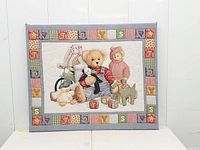 Full view of quilted wall art panel showing entire design and frame