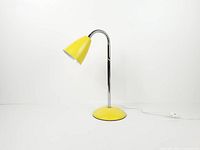 Lamp angled forward showing cone shade, gooseneck, round base, cord and plug