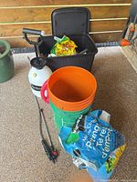 Group shot showing Flo-Master sprayer, storage bin, buckets, potting mix, sprayer wand