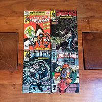 All four comic book covers side by side