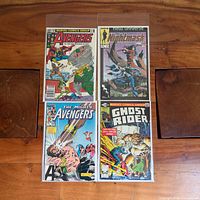 Group shot of all four bagged comic books