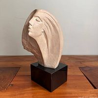 Front view of Stargazer female bust on pedestal